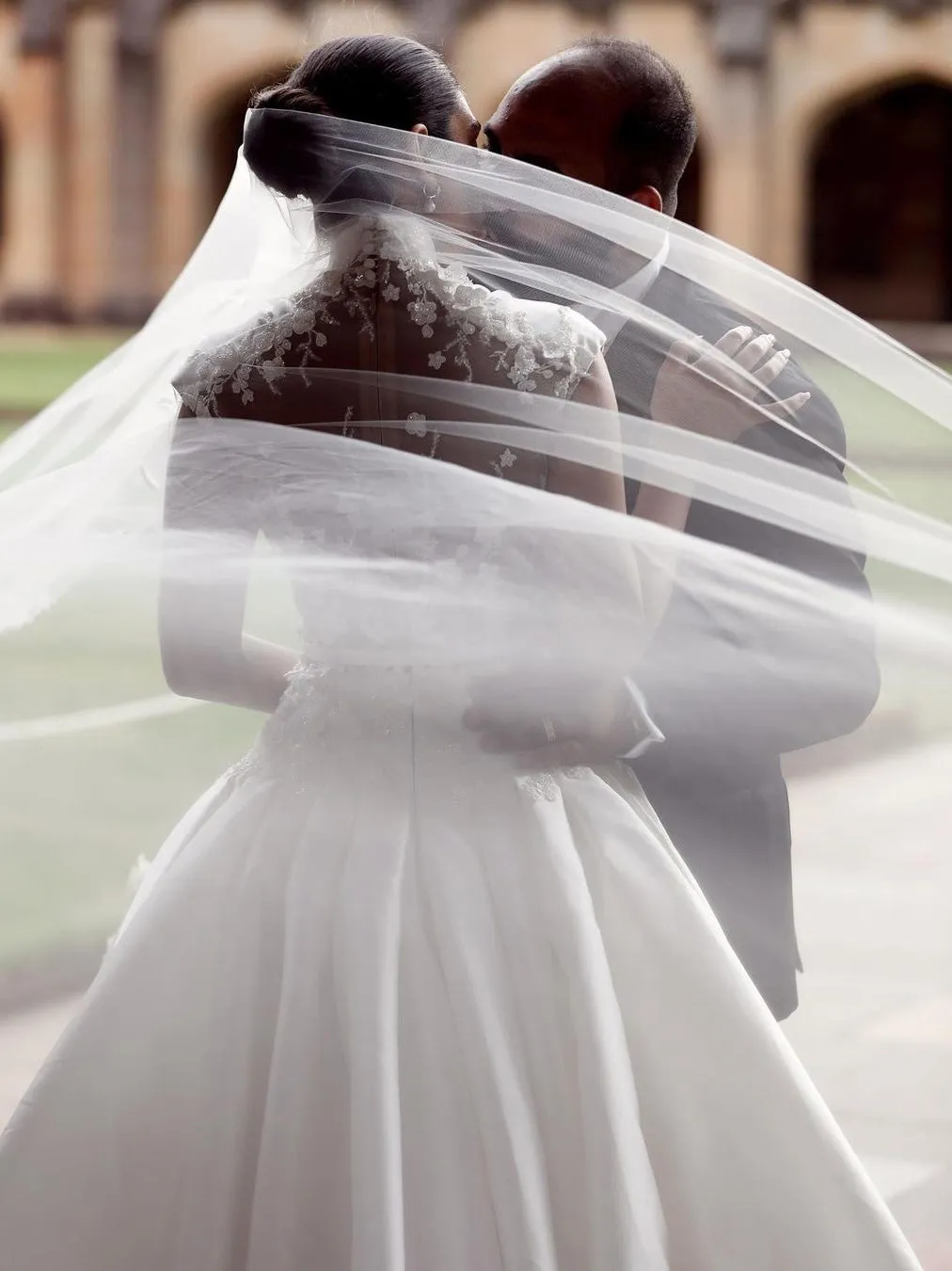 Elegant Satin Beaded Appliqued V-neckline A-line Chapel Train Bridal Gowns WD561